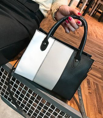 Модная женская сумка со стильными вставками